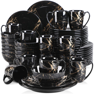 Elegant black dinnerware set with gold splatter design, modern luxury tableware for formal dining and special occasions